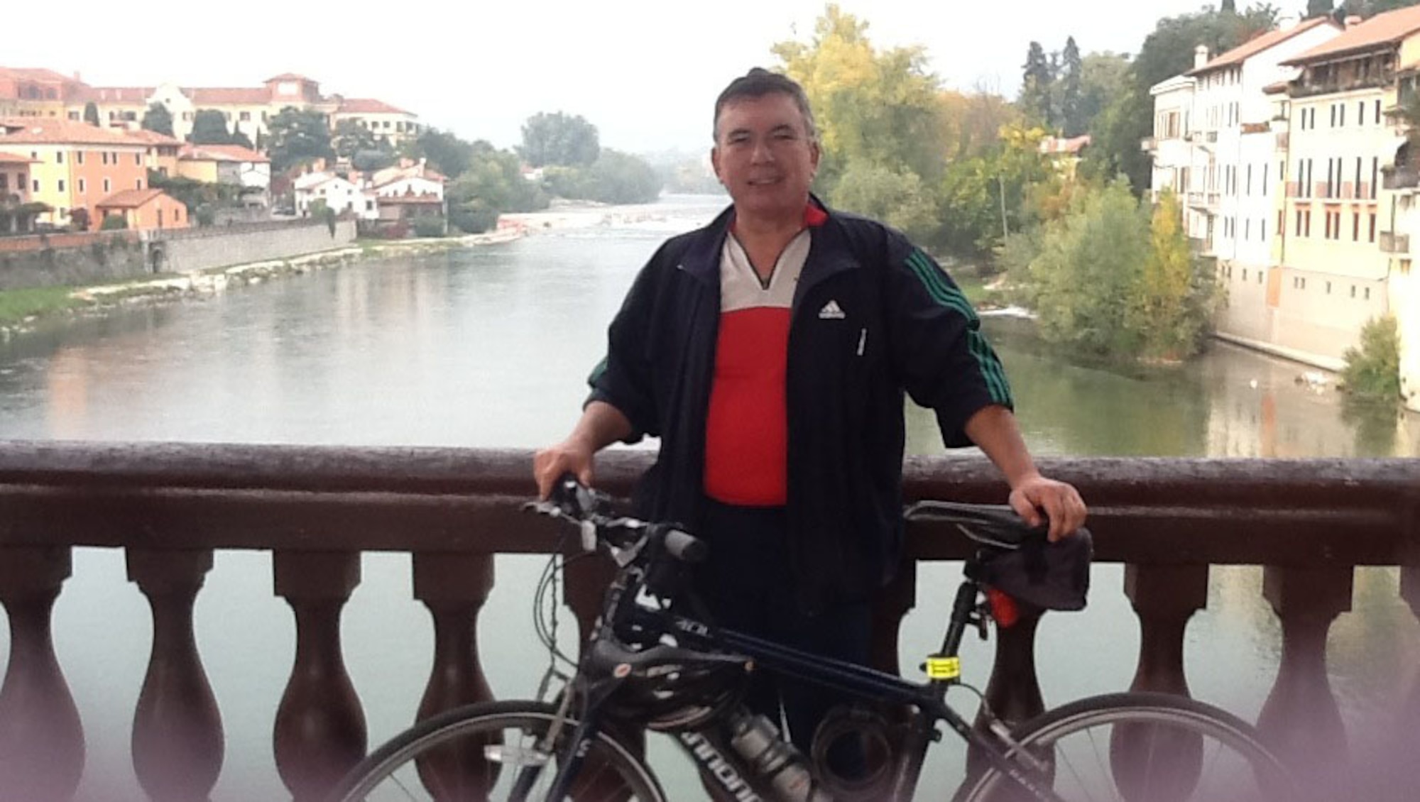 Mike Nishimuta poses for a photo after completing a 50-mile bike ride from Venice to Bassano, Italy, Oct. 19, 2013. In 1968, the Oklahoma native biked more than 3,000 miles through Europe over a five month period. 