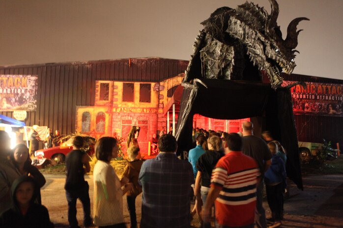 A large beast stands guard at the entrance of the Panic Attack haunted attraction. Panic Attack is one of North Carolina's largest, yearly haunted houses, and is located in close proximity to Marine Corps Base Camp Lejeune and Marine Corps Air Station New River.