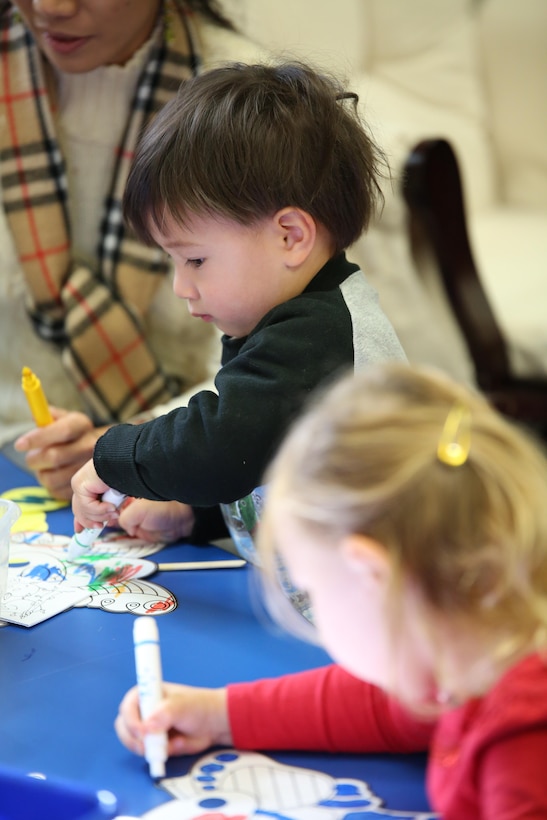 Taiyo, 2, colors a craft during an event hosted by the New Parent Support Program at Little Hall on Oct. 25, 2013. The event was themed after the children’s book, “The Very Hungry Caterpillar” and provided many resources to assist parents with their children’s nutrition.