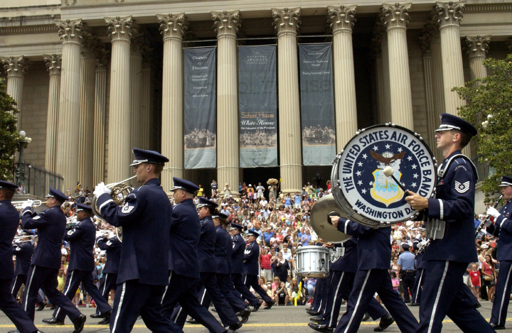Airmen from the Air Force Band march in front of the National Archives during the National Memorial Day Parade May 28, 2013, in Washington, D.C. The parade highlighted the Air Force's 60th anniversary as a separate service. 