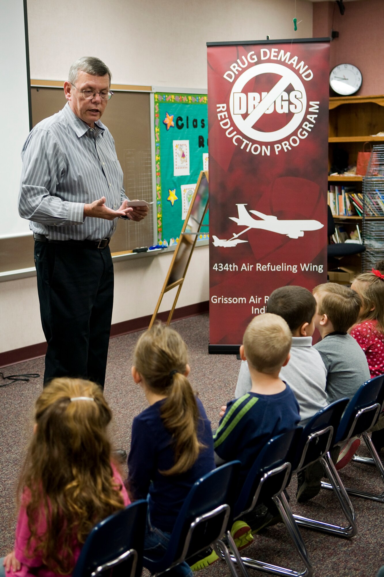 Gary Flook, 434th Air Refueling Wing drug demand reduction specialist, speaks to kindergarten students at Pipe Creek Elementary in Peru, Ind., about how they can deal with peer pressure and say no to drugs and alcohol Oct. 22. Each year Flook leads a team of Airmen from Grissom Air Reserve Base, Ind., into schools in the local communities to discuss the dangers of drug and alcohol abuse. (U.S. Air Force photo/Tech. Sgt. Mark R. W. Orders-Woempner) 
