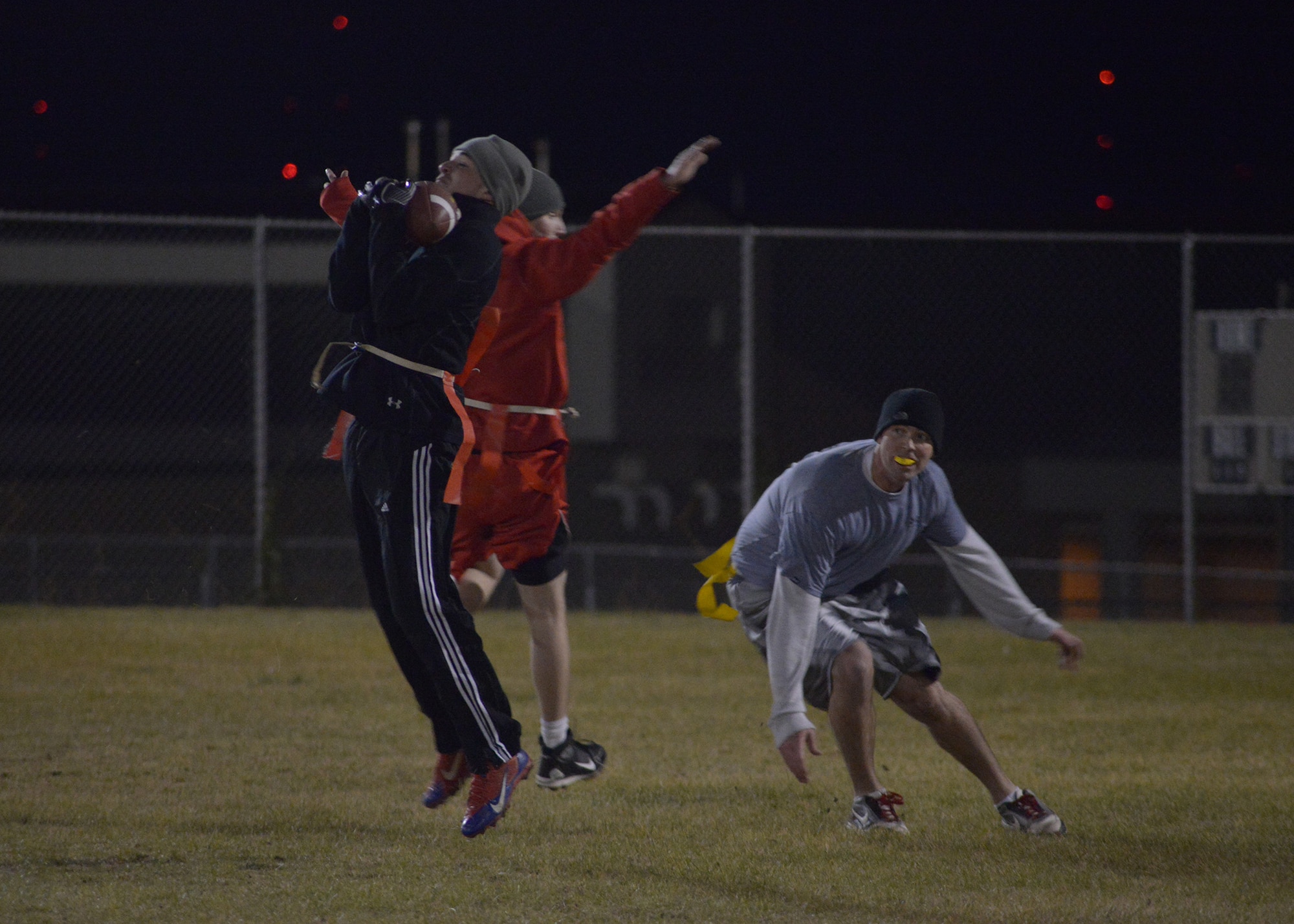 Airman 1st Class Taylor Dunlap, 341st Civil Engineer Squadron technician, makes a catch resulting in a 10- yard gain during one of the last plays of a flag-football game Oct. 17. This year’s flag-football season has had the best turnout, with more than 100 players participating. (U.S. Air Force photo/Airman 1st Class Collin Schmidt)
