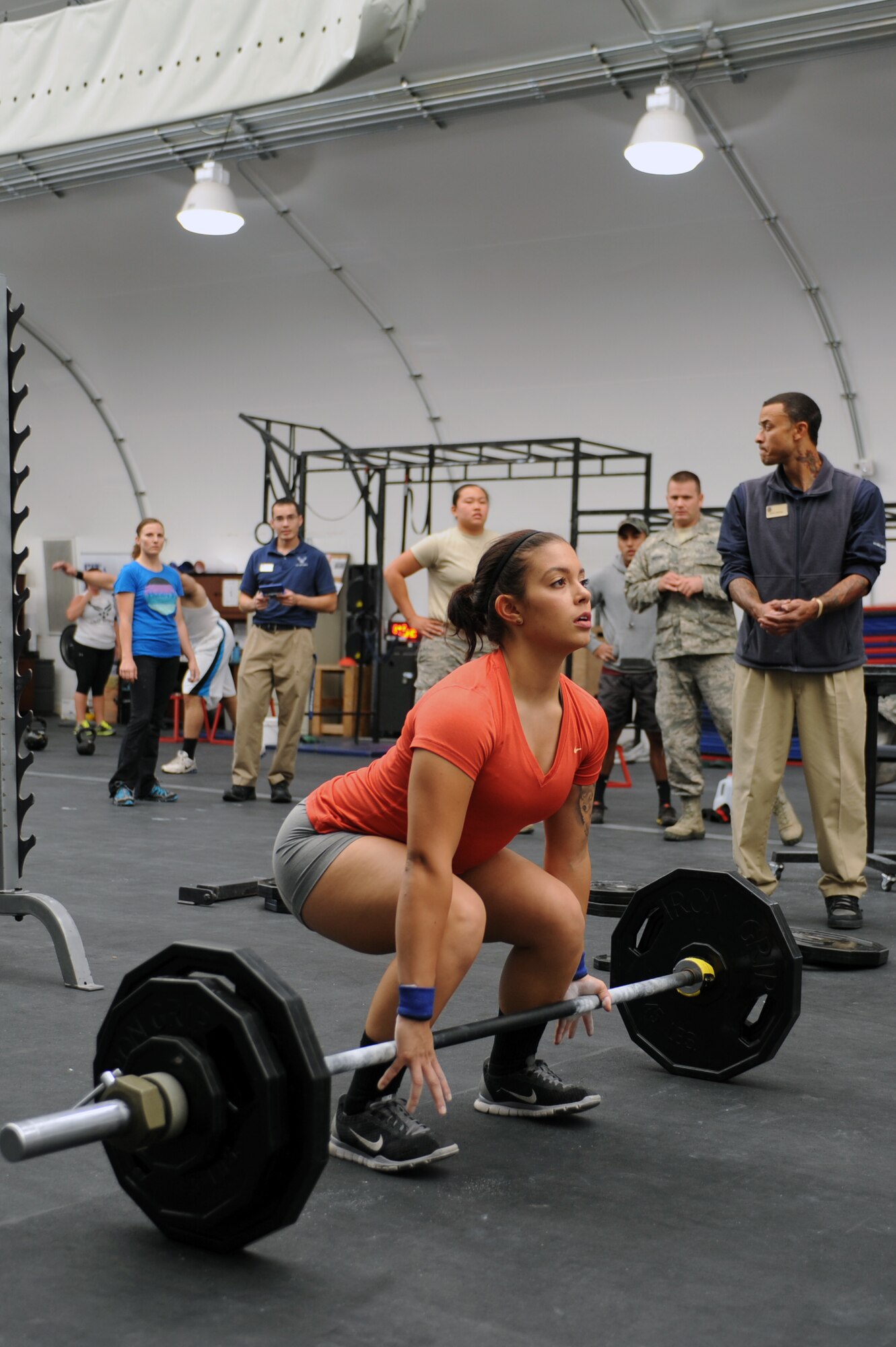 Airman 1st Class Gabrielle Asalin, 756th Aircraft Maintenance Squadron weapons load crew member, demonstrates good form and grip preparation for a dead lift at the 56th Force Support Squadron Combat Fitness Center. Asalin won the female most weight combined event lifting 1,260 pounds. (U.S. Air Force photo/Airman 1st Class Pedro Mota)