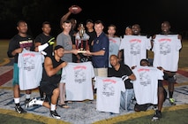 Members of the 1st Special Operations Logistics Readiness Squadron celebrate their seventh consecutive year of winning the Intramural Flag Football Tournament at Hurlburt Field, Fla., Oct. 18, 2013. “It was one of the best games I’ve seen in years,” said Jeff Miller, the head official refereeing the game. (U.S. Air Force photo/Senior Airman Kentavist P. Brackin) 