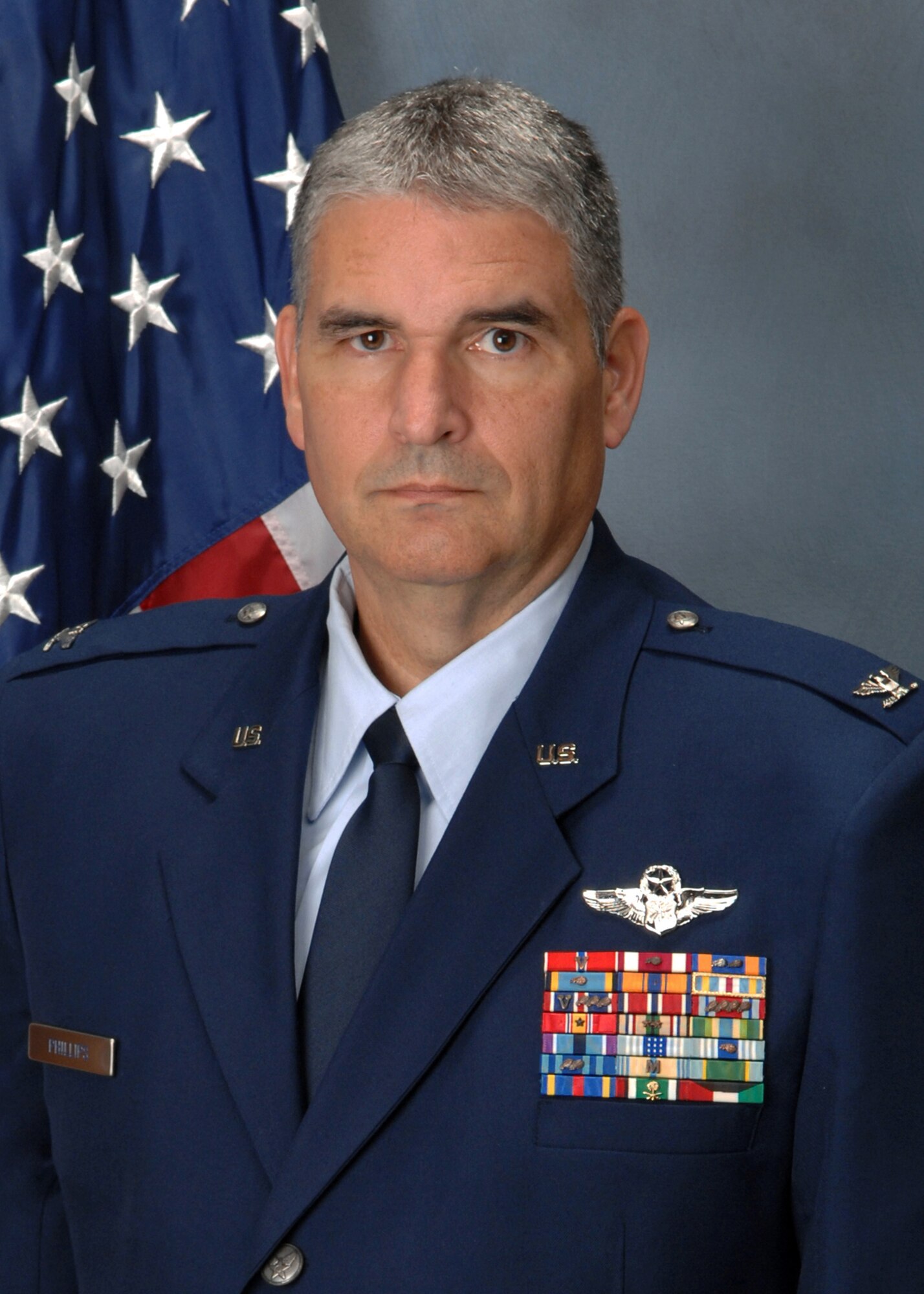Col. James Phillips assumes command of the 919th Special Operations Wing during a ceremony at Duke Field, Fla., Dec. 7. (U.S. Air Force photo)