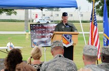 Colonel Chris Funk, 482nd Fighter Wing commander, addresses the crowd during a groundbreaking ceremony for Homestead’s new Army and Air Force Exchange Service ‘Express with Gas’ Oct. 25. The Express, scheduled to be completed in July of 2014, features eight gas pumps, a military clothing sales, a dry cleaners, a GNC, and all the items traditionally found in an Express facility. (U.S. Air Force photo/Ross Tweten)