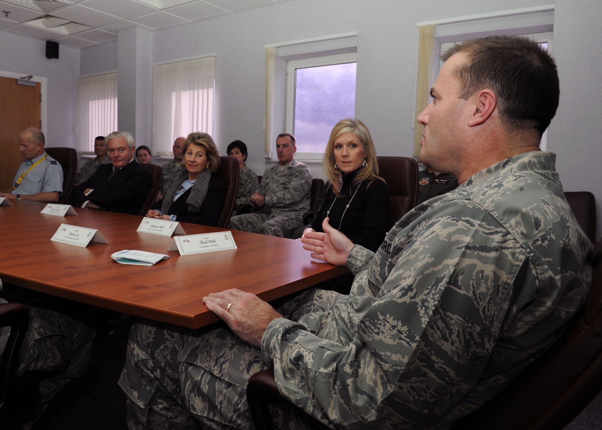 U.S. Air Force Col. Kenneth T. Bibb Jr., right, 100th Air Refueling Wing commander, addresses local high sheriffs Oct. 23, 2013, on RAF Mildenhall, England. The high sheriffs learned about the 100th ARW mission, its units, tenant units and how they fit together. Bibb explained how the mission affects the local community. The distinguished guests had the opportunity to visit the base and meet some of the service members stationed here. (U.S. Air Force photo by Airman 1st Class Preston Webb/Released)