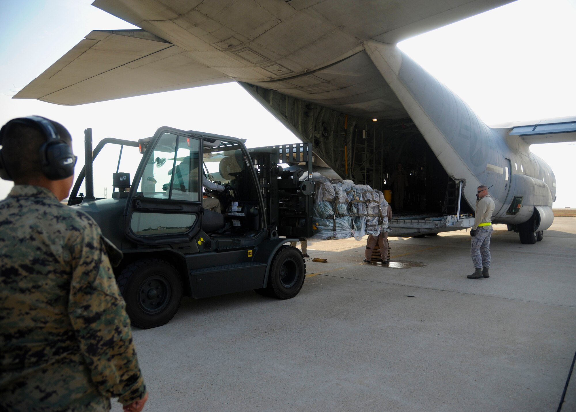 A C-130 Hercules from Iwakuni Marine Corps Air Station, Japan, arrives at Kunsan Air Base, Republic of Korea, Oct. 24, 2013 as part of exercise Max Thunder 13-2. The purpose of the exercise is to enhance the combat readiness of U.S. and ROK air forces and supporting forces through combined and joint large-force employment training. (U.S. Air Force photo by Staff Sgt. Jessica Haas/Released)