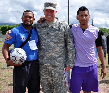 U.S. Army Col. Thomas Boccardi, Joint Task Force-Bravo commander, presented soccer balls to participants of the Honduras Special Olympics soccer tournament at Soto Cano Air Base, Honduras, Oct. 25, 2013.  Boccardi presented the balls as part of "Kick for Nick," a non-profit organization founded in honor of U.S. Army Pvt. Nick Madaras. While serving in Iraq in 2006, Madaras gathered soccer balls to give to underprivileged children near his post. However, he was killed and was never able to distribute the balls himself. Shortly after his death, the "Kick for Nick" organization was established in his honor. Today, soccer balls are donated and distributed to underprivileged children around the world through "Kick for Nick," in memory of Pvt. Madaras. (U.S. Air Force photo by Capt. Zach Anderson)