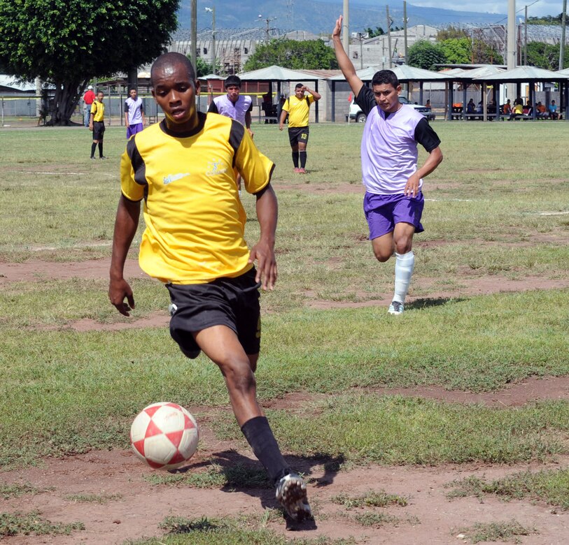 Honduran Special Olympics athletes compete in a soccer match at Soto Cano Air Base, Honduras, Oct. 26, 2013.  Joint Task Force-Bravo partnered with Special Olympics-Honduras and the Honduran Air Force to host the Special Olympics soccer tournament.  (Photo by Martin Chahin)