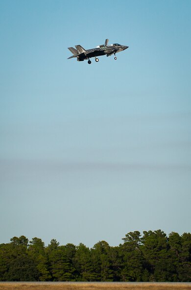 A Marine F-35B joint strike fighter hovers over the runway during the first short take-off and vertical landing mission at Eglin Air Force Base, Fla., Oct. 25. The milestone training mission was flown by Maj. Brendan M. Walsh, of the Marine Fighter Attack Training Squadron-501.  Walsh recently qualified in vertical landing operations at Marine Corps Air Station Yuma, Ariz. in preparation for this mission.  (U.S. Air Force photo/Samuel King Jr.)