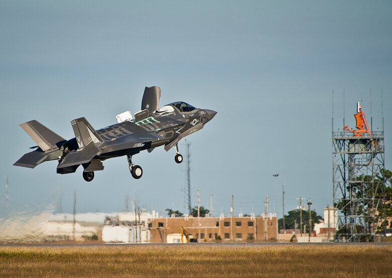 A Marine F-35B joint strike fighter lifts off from the runway during the first short take-off and vertical landing mission at Eglin Air Force Base, Fla., Oct. 25. The milestone training mission was flown by Maj. Brendan M. Walsh, of the Marine Fighter Attack Training Squadron-501.  Walsh recently qualified in vertical landing operations at Marine Corps Air Station Yuma, Ariz. in preparation for this mission.  (U.S. Air Force photo/Samuel King Jr.)