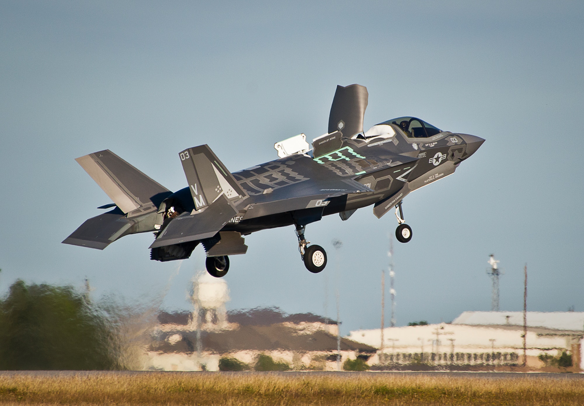 A Marine F-35B joint strike fighter lifts off from the runway during the first short take-off and vertical landing mission at Eglin Air Force Base, Fla., Oct. 25. The milestone training mission was flown by Maj. Brendan M. Walsh, of the Marine Fighter Attack Training Squadron-501.  Walsh recently qualified in vertical landing operations at Marine Corps Air Station Yuma, Ariz. in preparation for this mission.  (U.S. Air Force photo/Samuel King Jr.)