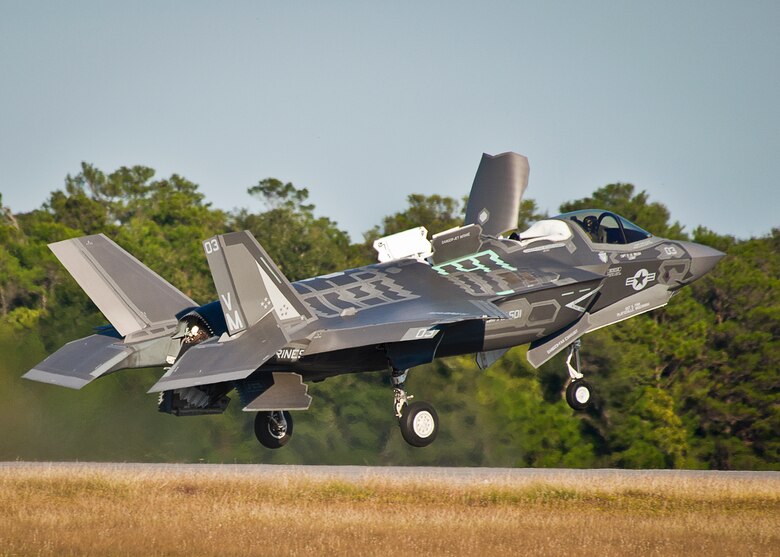 A Marine F-35B joint strike fighter lifts off from the runway during the first short take-off and vertical landing mission at Eglin Air Force Base, Fla., Oct. 25. The milestone training mission was flown by Maj. Brendan M. Walsh, of the Marine Fighter Attack Training Squadron-501.  Walsh recently qualified in vertical landing operations at Marine Corps Air Station Yuma, Ariz. in preparation for this mission.  (U.S. Air Force photo/Samuel King Jr.)