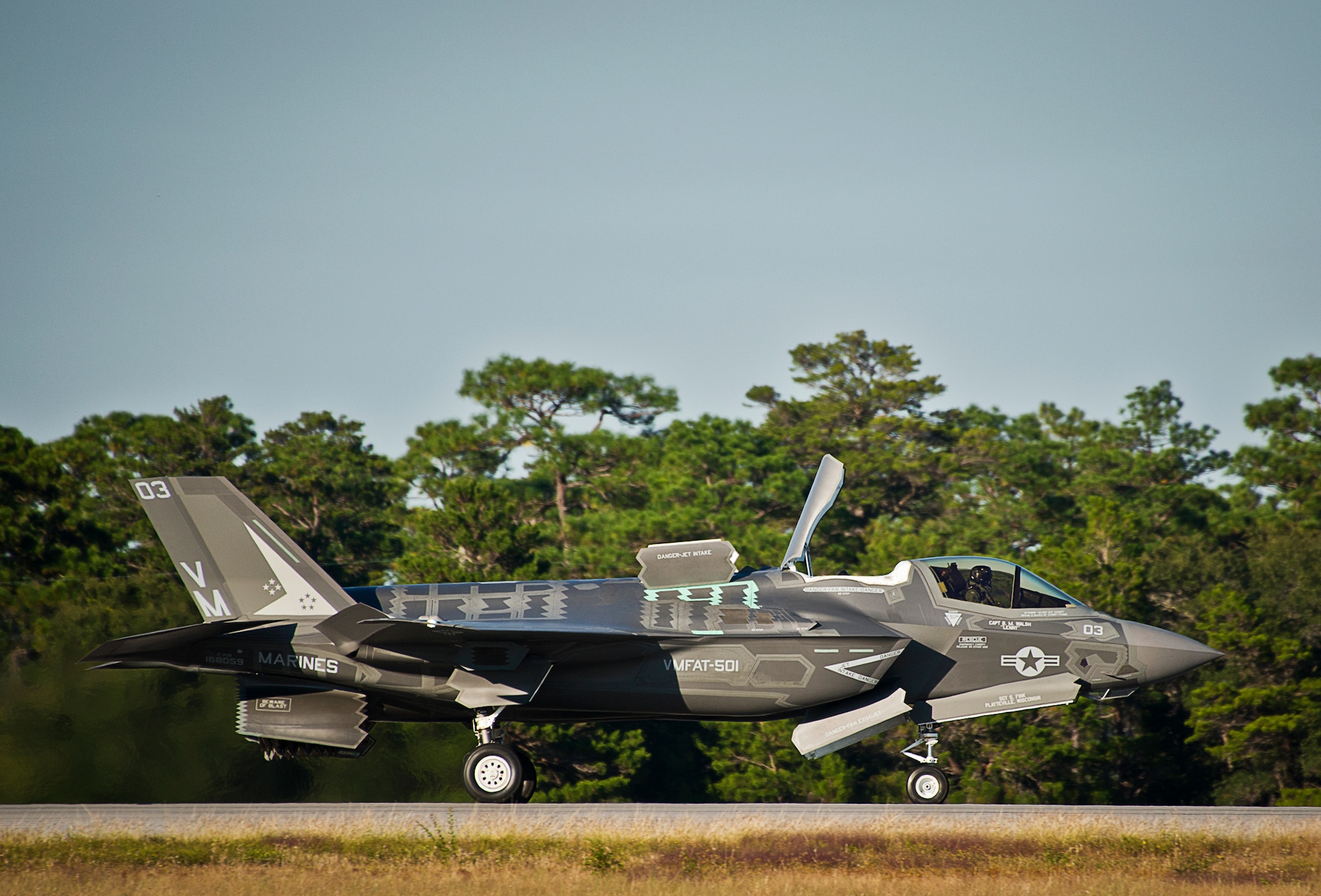 A Marine F-35B joint strike fighter makes an approach to the runway during the first short take-off and vertical landing mission at Eglin Air Force Base, Fla., Oct. 25. The milestone training mission was flown by Maj. Brendan M. Walsh, of the Marine Fighter Attack Training Squadron-501.Walsh recently qualified in vertical landing operations at Marine Corps Air Station Yuma, Ariz. in preparation for this mission.(U.S. Air Force photo/Samuel King Jr.)