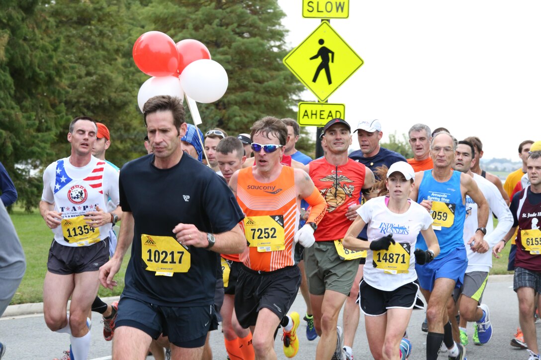Runners pass the 13th mile of the Marine Corps Marathon in Washington, D.C., on Oct. 27, 2013. The Marine Corps hosted its 38th marathon this year.