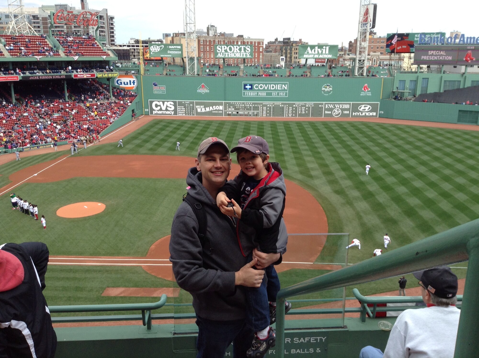 Capt. Garrett Miller and his son, Jacoby, had their photo taken April 15, 2013, during a Red Sox game at Fenway Park on Patriot's Day shortly before Miller’s deployment. Capt. Miller is a physician assistant currently working in flight medicine for the 4th Expeditionary Reconnaissance Squadron, deployed from Hanscom Air Force Base. Mass. Capt. 