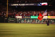 Marines with Recruiting Station St. Louis present the American and Marine Corps colors at game 3 of the 2013 World Series Oct. 25 at Busch Statium, St. Louis, MO. (U.S. Marine Corps photo by Cpl. Erik S. Brooks Jr.)