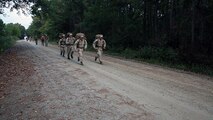 Marines with Improved Ribbon Bridge Platoon, 8th Engineer Support Battalion, 2nd Marine Logistics Group run with weighted packs during a field exercise aboard Camp Lejeune, N.C., Oct. 25, 2013. This field exercise was the start of many to come and Bridge Co. plans to start conducting patrolling exercises and demolition ranges now that their boat operations are completed.