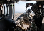 Sgt. Brandon Coburn is hoisted back into a UH-60 Black Hawk helicopter during a training exercise near Forward Operating Base Fenty, Nangarhar Province, Afghanistan, Sept. 16, 2013.