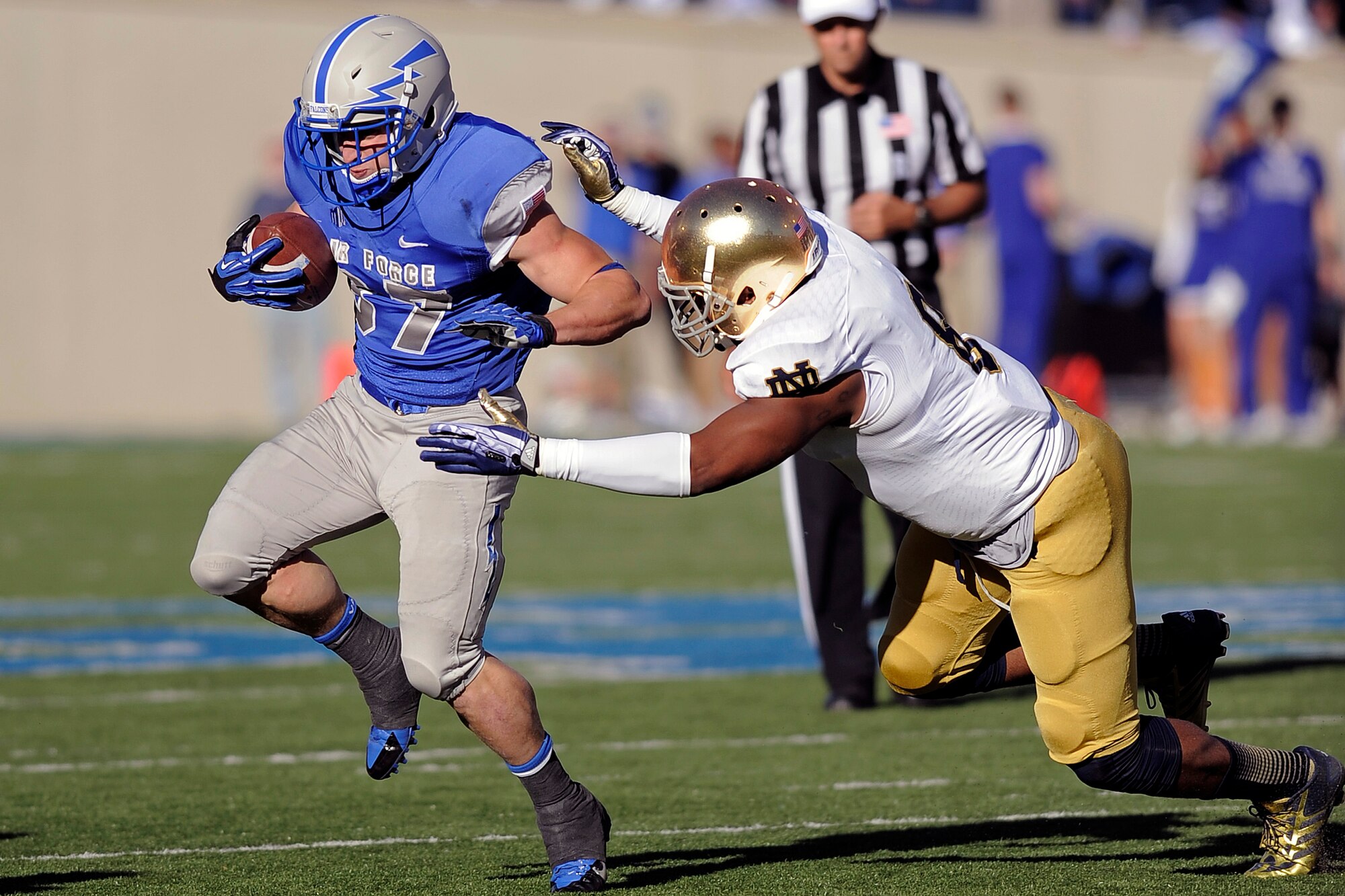 Senior running back Anthony LaCoste breaks away from Notre Dame linebacker Jaylon Smith during the Air Force-Notre Dame gameOct. 26, 2013 at Falcon Stadium . LaCoste had eight rushes for 54 yards.