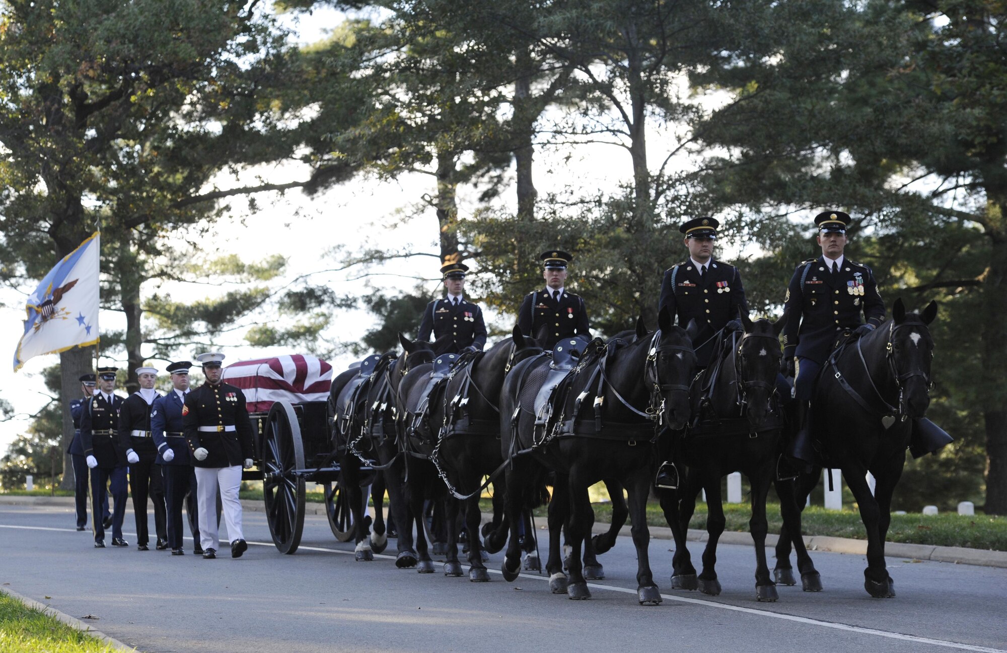 U.S. Army, Caisson Platoon, 3d U.S. Infantry Regiment (The Old Guard) leads a joint service casket team, carrying retired Gen. David C. Jones to his final resting place Oct. 25, 2013, at Arlington National Cemetery, Va. Jones served four years as Air Force chief of staff from 1974 to 1978 until he was appointed as chairman of the Joint Chiefs of Staff June 21, 1978. As chairman, Jones served longer than all of his predecessors, serving from 1978 to 1982. During this time he was responsible for executing the decisions of the National Command Authorities regarding worldwide readiness and employment of combat forces of the U.S. Army, Navy, Air Force and Marine Corps.   