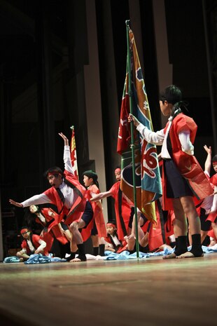 Iwakuni Municipal Kawashimo Elementary School students perform the “Sohran Folk Dance” during the U.S.-Japan Friendship Concert, which took place inside the Sinfonia Iwakuni, March 2, 2013. The concert consisted of multiple songs and performances by several local Japanese schools and Matthew C. Perry Elementary and High School students.