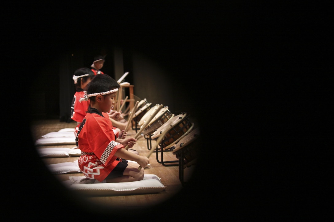 Iwakuni Municipal Kawashimo Elementary School students perform the “Sohran Folk Dance” during the U.S.-Japan Friendship Concert, which took place inside the Sinfonia Iwakuni, March 2, 2013. The concert consisted of multiple songs and performances by several local Japanese schools and Matthew C. Perry Elementary and High School students.
