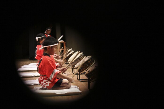 Iwakuni Municipal Kawashimo Elementary School students perform the “Sohran Folk Dance” during the U.S.-Japan Friendship Concert, which took place inside the Sinfonia Iwakuni, March 2, 2013. The concert consisted of multiple songs and performances by several local Japanese schools and Matthew C. Perry Elementary and High School students.