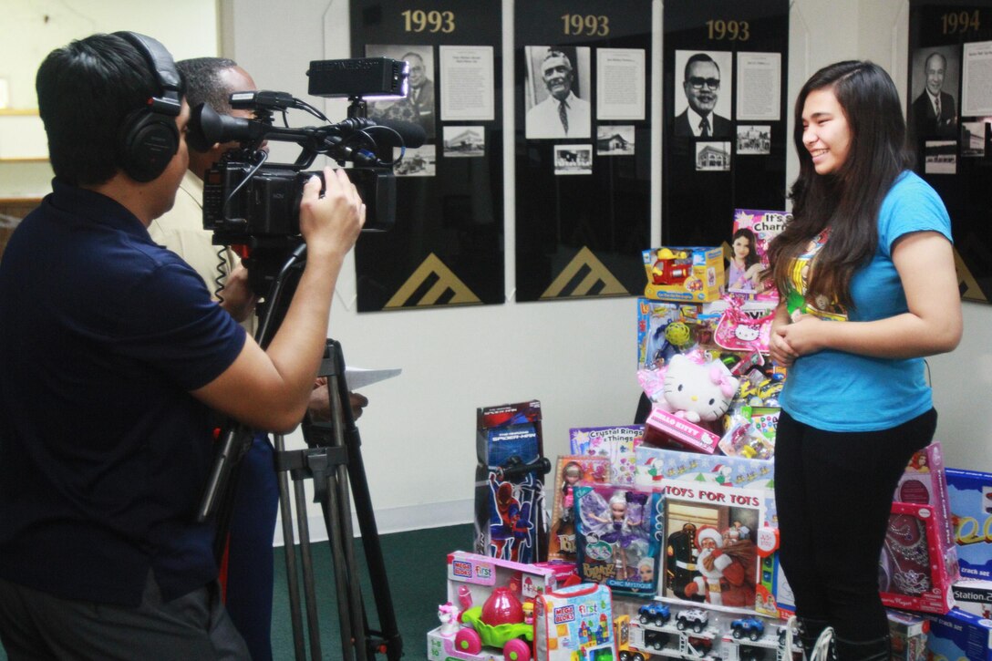 Noah Martin, native of Santa Rita, Guam, speaks during an interview after her donation of gifts to Toys for Tots at the Guam Chamber of Commerce Offices.  Martin, a 16-year-old Junior at Southern Christian Academy, asked family and friends for gifts for Toys for Tots at her 16th birthday party in-lieu of presents for herself.  Her generous act resulted in a donation of over 60 items to the Guam Toys for Tots campaign.
