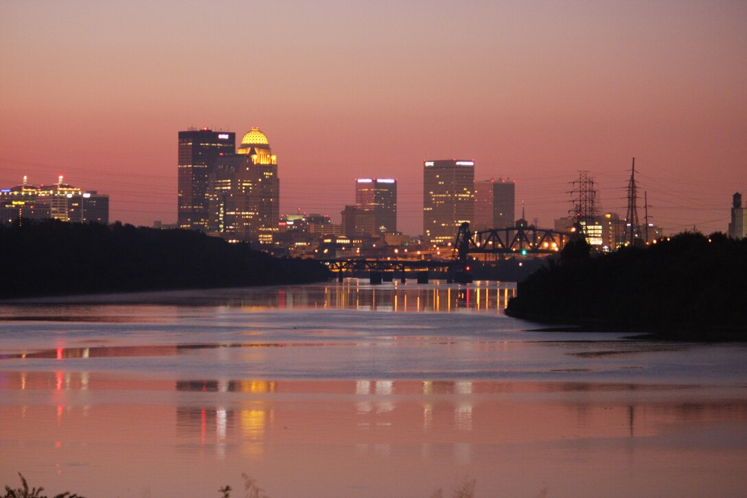The Louisville skyline is seen from McAlpine Locks and Dam on the Ohio River.