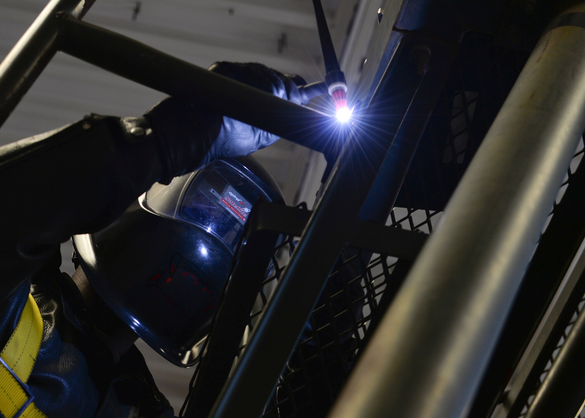Staff Sgt. Charles Marsh, 1st Special Operations Equipment Maintenance Squadron aircraft metals technology craftsman, welds a handrail on a B-2 stand at Hurlburt Field, Fla. Oct. 24, 2013. Maintenance stands are a crucial part of aircraft maintenance and are maintained and serviced locally to ensure mission readiness.(U.S. Air Force Photo Staff Sgt. John Bainter)