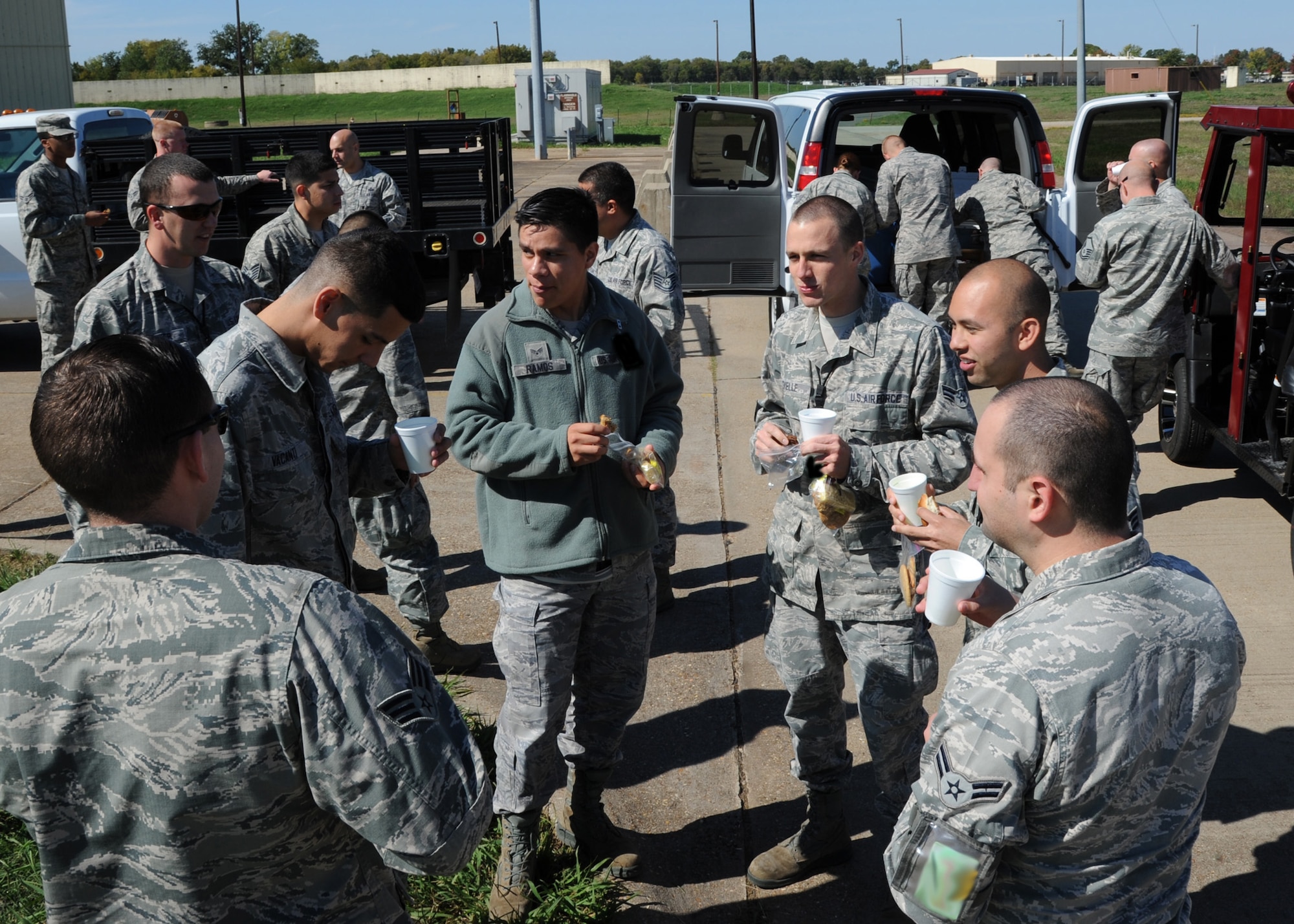 Airmen from the 2nd Munitions Squadron enjoy refreshments on Barksdale Air Force Base, La., Oct. 25, 2013. Base first sergeants delivered food and drinks around base to boost Airmen morale. The cookie drive was a way for the first sergeants to give back to the Airmen and say thank you for what they do. (U.S. Air Force photo/Senior Airman Joseph A. Pagán Jr.)