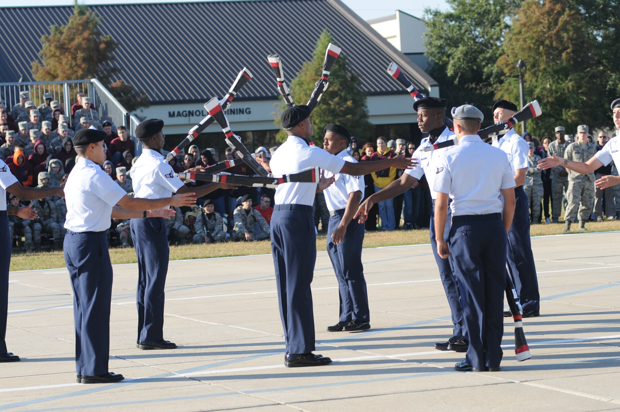 Members of the 335th Training Squadron freestyle drill team perform during the 81st Training Group drill down competition Oct. 25, 2013, at the Levitow Training Support Facility, Keesler Air Force Base, Miss. The 335th TRS took first place in freestyle and second place in open ranks, regulation and overall.  (U.S. Air Force photo by Kemberly Groue)