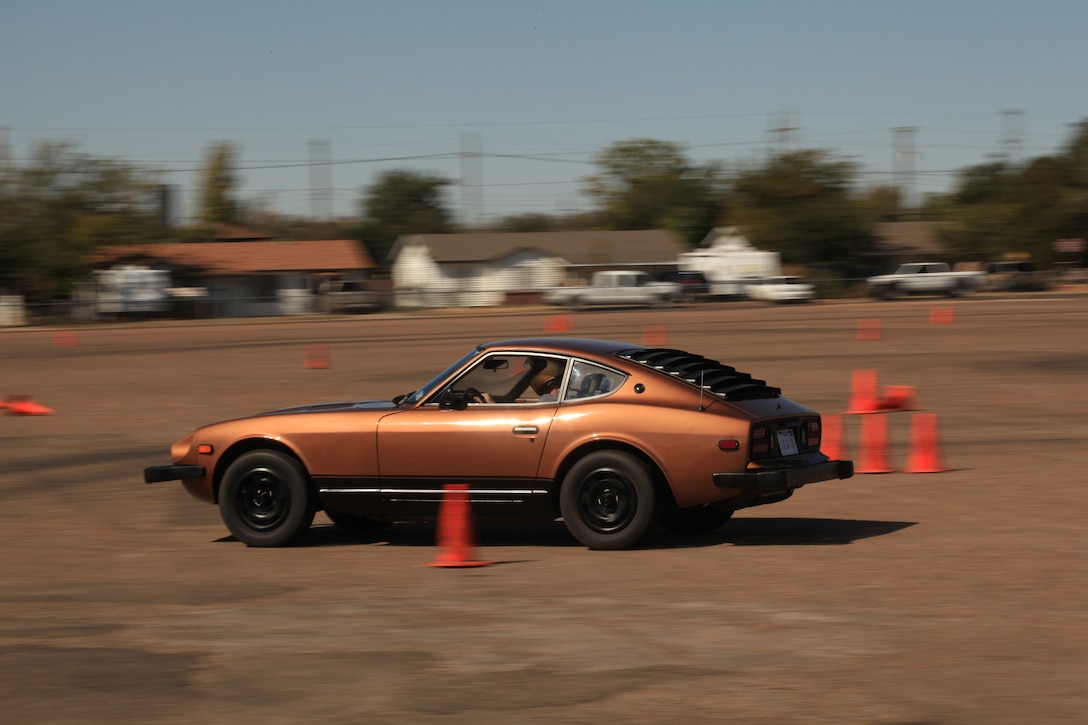 A car races through the autocross course Oct. 20, 2013, in Amarillo, Texas.  Three Air Commandos from Cannon Air Force Base, N.M., competed in the event.  (U.S. Air Force photo/Senior Airman Jette Carr)