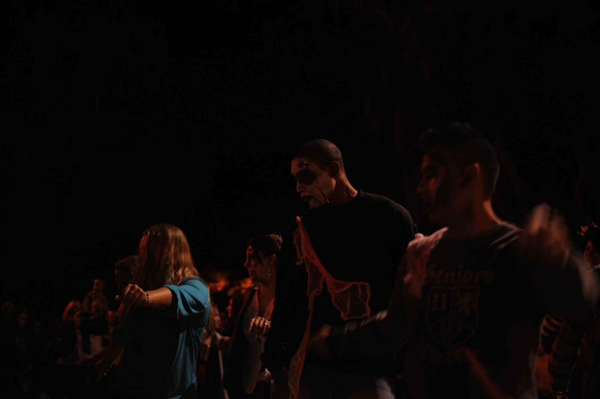 Keesler Airmen perform a “flash mob” dance to Michael Jackson’s Thriller during the Ghouls in the Park event at the marina park Oct. 25, 2013, Keesler Air Force Base, Miss. Technical training student Airmen and those awaiting further instruction in the 81st Training Group volunteered as “ghouls” to roam around, direct attendees and lead a flash mob at the end of the night to Michael Jackson’s Thriller. (U.S. Air Force photo by Airman 1st Class Stephan Coleman)