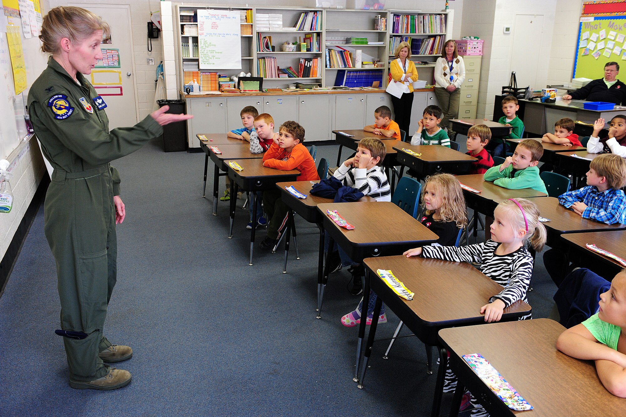 U.S. Air Force Col. Jeannie Leavitt, 4th Fighter Wing commander, talks to kindergartners about being a commander and an F-15E pilot during a career day event at St. Mary’s Catholic School in Goldsboro, N.C., Oct. 24, 2013.  Many children asked questions about the F-15E Strike Eagle and what it’s like to be a fighter pilot.  (U.S. Air Force photo by Airman 1st Class Brittain Crolley)