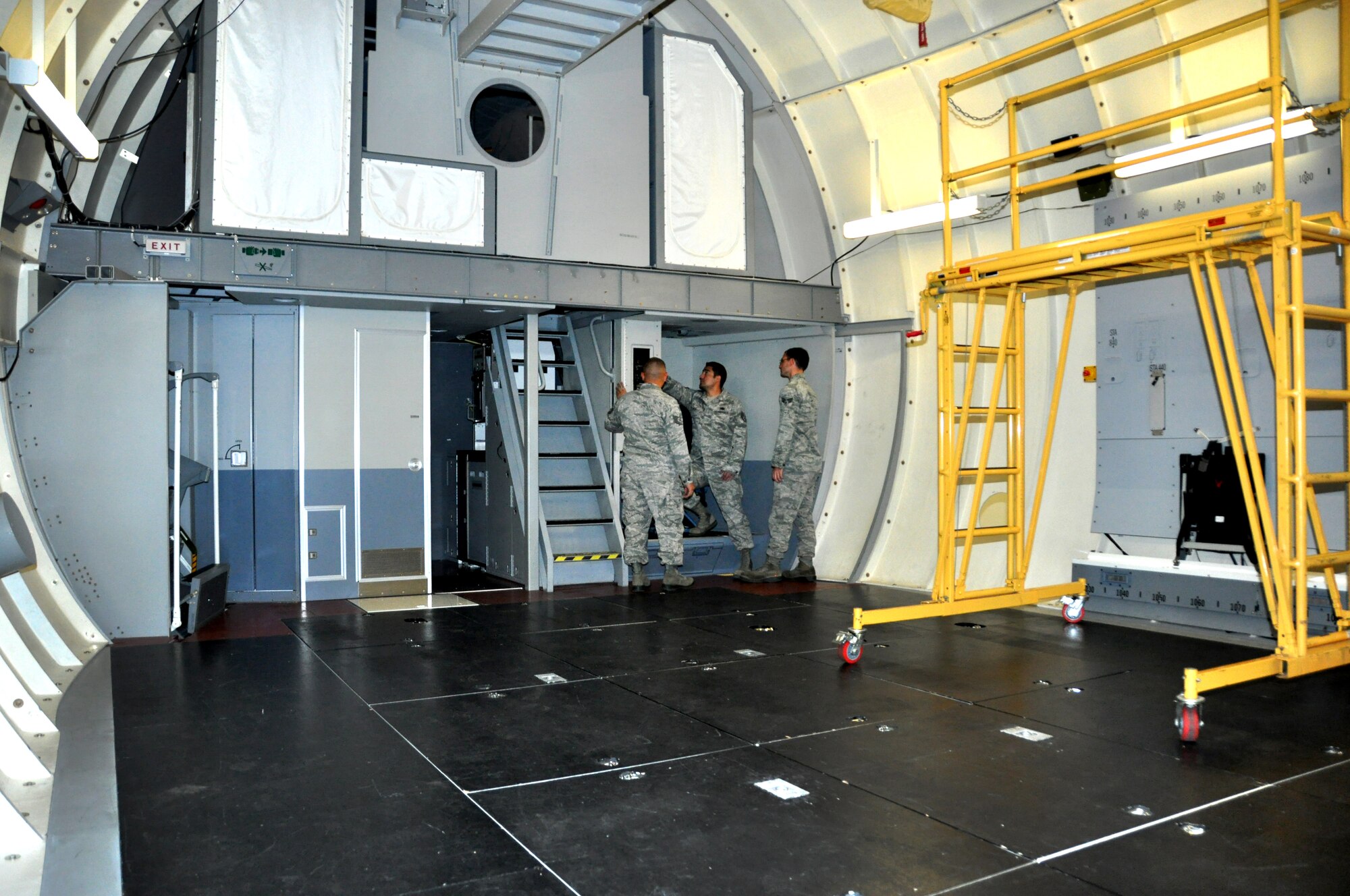 60th Maintenance Group electrical/enviromental technicians train on the Aircraft Maintenance System Trainer Oct. 18. in the 373rd TRS Det 14 C-17 training facility. (U.S. Air Force photo/Staff Sgt. Patrick Harrower)