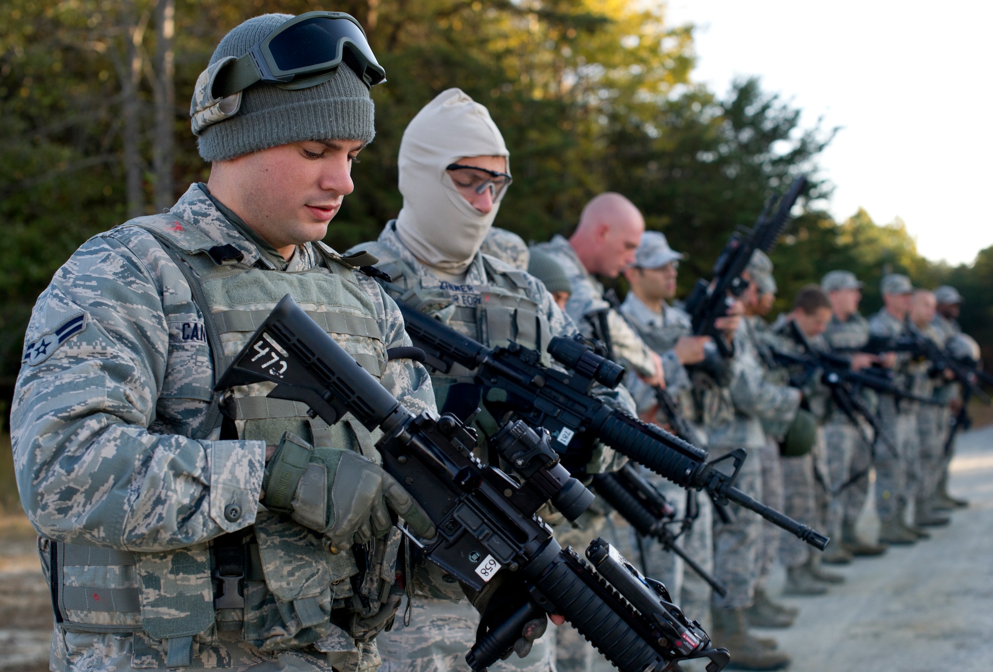 FORT A.P. HILL, Va. – Security Forces members of the 817th Contingency Response Group prepare for training during an exercise here Oct. 22. The 817 CRG training focused on airfield operations, which included training for the assessment team, landing zone safety officer, and other unit type code training objectives. (U.S. Air Force photo by Staff Sgt. Gustavo Gonzalez)