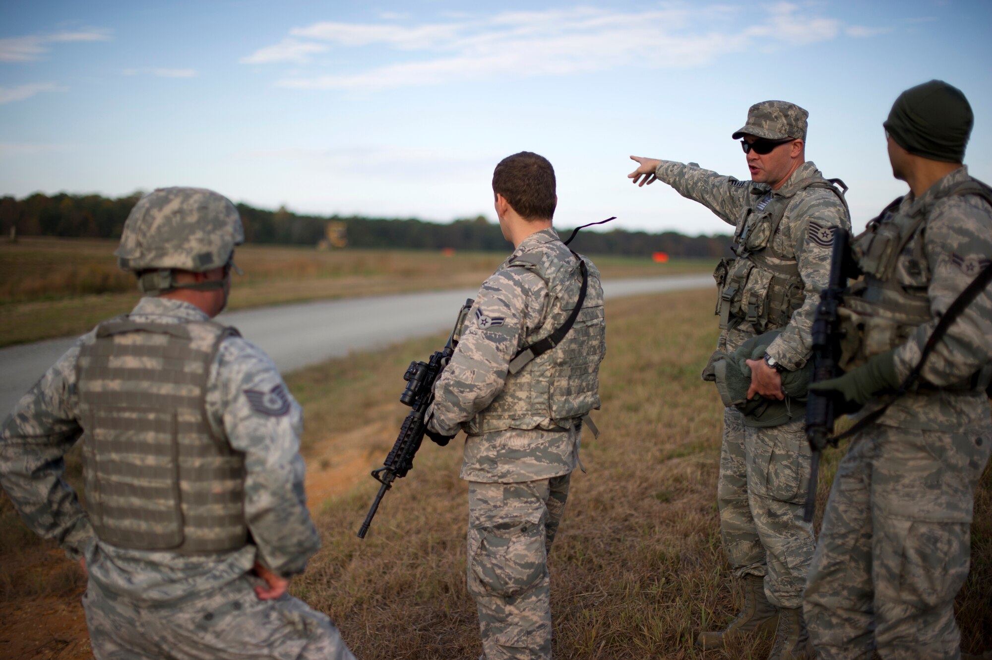FORT A.P. HILL, Va. – Tech. Sgt. Andrew Acosta, 817th Contingency Response Group security forces, trains airmen on entry control point techniques during an exercise here, Oct. 22. The 817 CRG training focused on airfield operations, which included training for the assessment team, landing zone safety officer, and other unit type code training objectives. (U.S. Air Force photo by Staff Sgt. Gustavo Gonzalez)