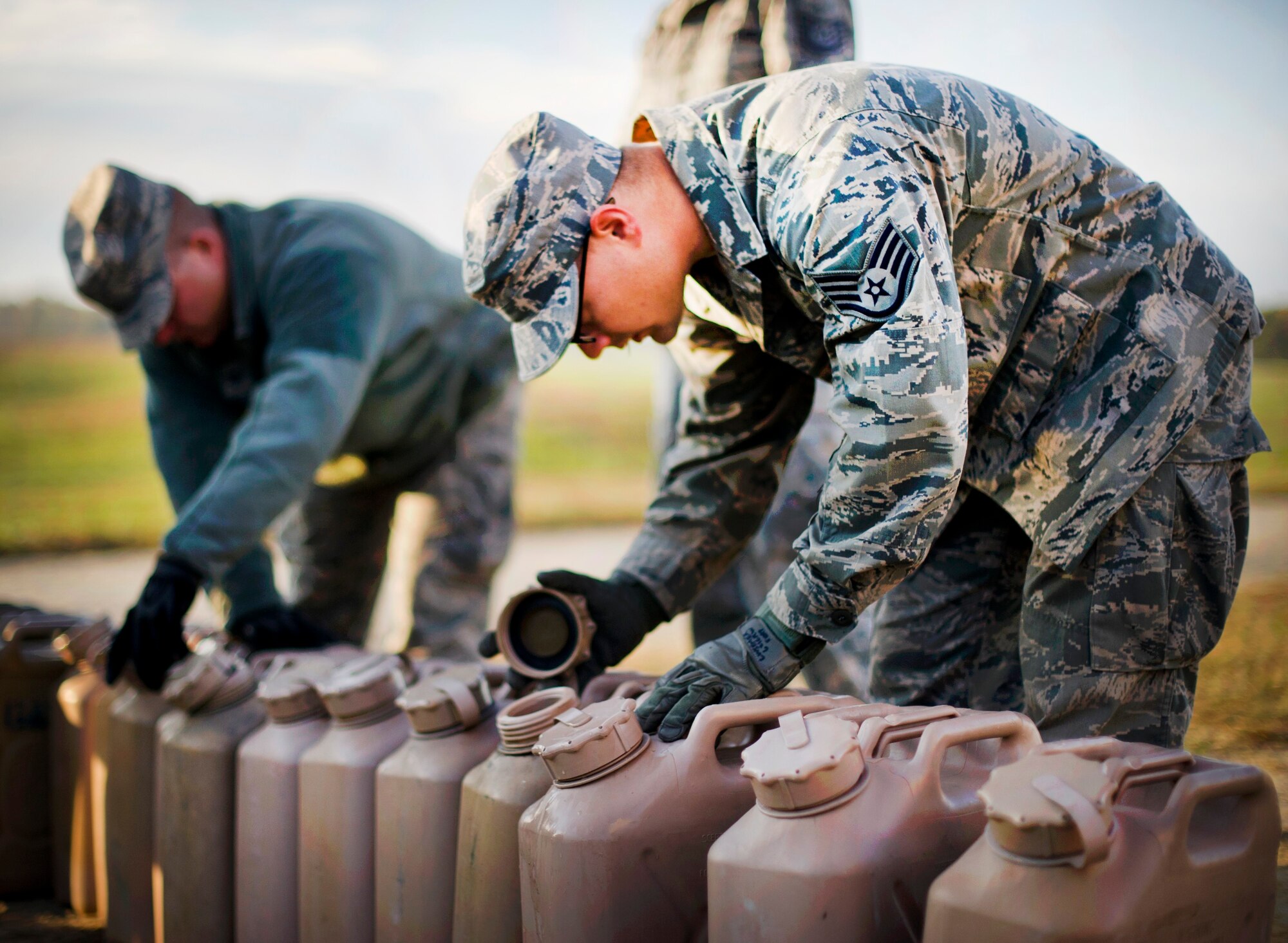 FORT A.P. HILL, Va. – An 817th Contingency Response Group Airman, checks fuel during an exercise here, Oct. 22. The 817 CRG training focused on airfield operations, which included training for the assessment team, landing zone safety officer, and other unit type code training objectives. (U.S. Air Force photo by Staff Sgt. Gustavo Gonzalez)