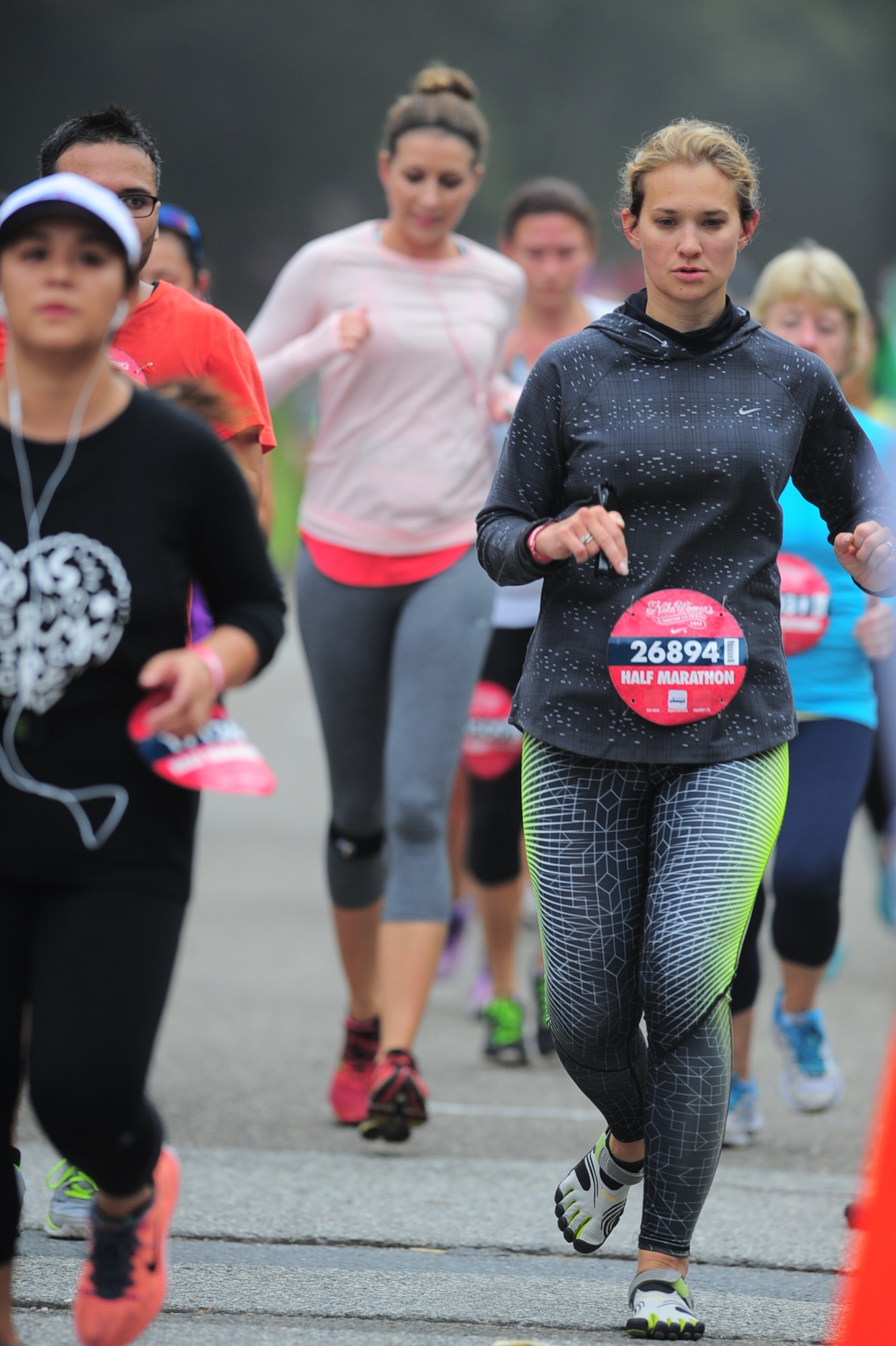 Tech. Sgt. Ashley Bean, 13th Intelligence Squadron imegery analyst stationed at Beale Air Force Base, runs in the Nike Women's half-marathon in San Francisco Oct. 20, 2013. Bean's husband, Staff Sgt. Phillip Bean, is a crew chief with the 60th Aircraft Maintenance Squadron stationed at Travis Air Force Base.