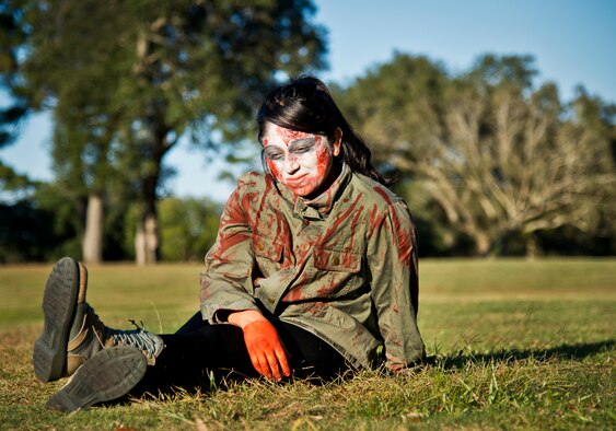 A somber zombie waits for the race to begin at the 2nd Annual Zombie Run Oct. 26 at the Eglin Air Force Base golf course.  More than 500 people attempted to outrun zombies and maneuver through various obstacles along the four-mile course.  (U.S. Air Force photo/Samuel King Jr.)