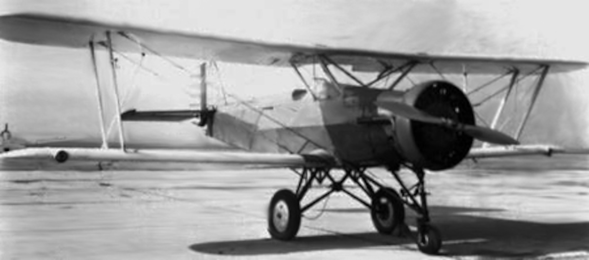 131028-Z-ZZ999-001 -- “Robot planes” like this one were successfully flown by remote control at Selfridge Field just prior to World War II, helping to pave the way for today’s modern unmanned aerial vehicles. In the early 1940s, several Douglas 0-2 aircraft were modified to serve as a test platform for a robot plane project, in which the aircraft was flown by remote control, either from a pilot in a trailing aircraft or in a control vehicle on the ground. The robot plane variant, known as the BT-2, included an oversize tricycle-style landing gear. In January 1941, the Sixth Pursuit Wing at Selfridge conducted extensive testing of the project, declaring success in a Jan. 11 press briefing. The date and location of the photo of this particular aircraft are unknown. (Air Force photo)