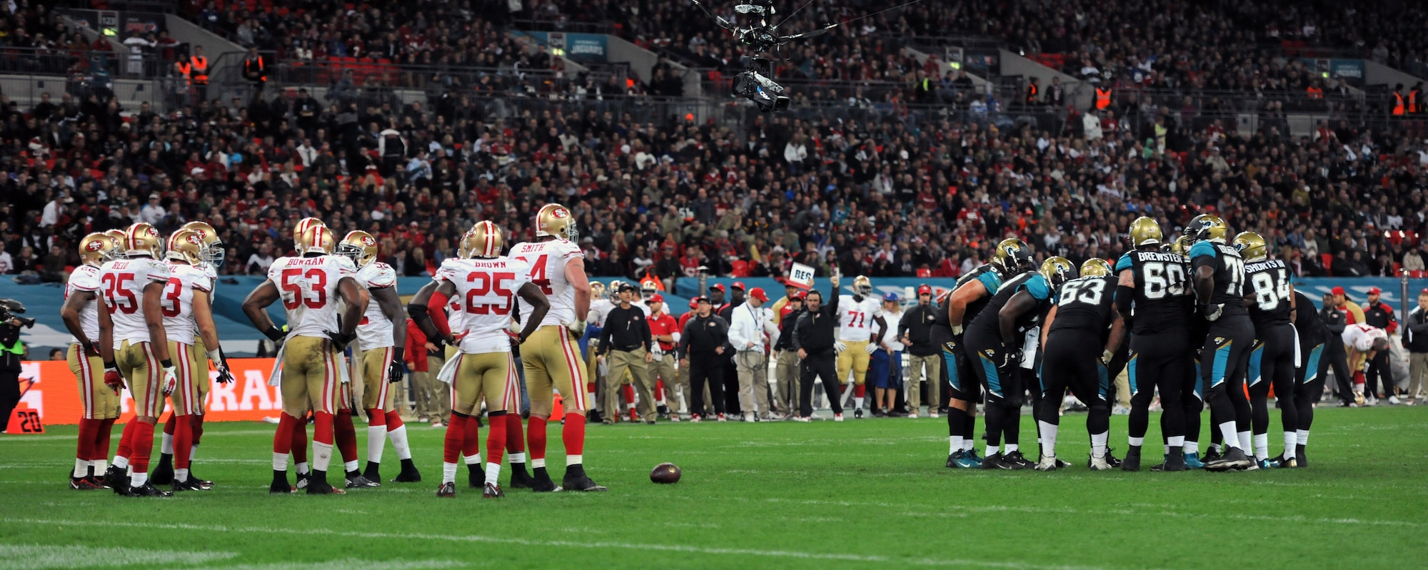 The National Football League’s Jacksonville Jaguars played the San Francisco 49ers in an internationally televised game Oct. 27, 2013, at Wembley Stadium in London, England. The NFL gave U.S. Air Force Airman 1st Class James Taylor, 100th Security Forces Squadron patrolman, and U.S. Air Force Airman Sara V. Summers, 48th Security Forces Squadron patrolman from RAF Lakenheath, the opportunity to lead rival football teams onto the field. The Jacksonville Jaguars lost the game against the San Francisco 49ers 42-10. (U.S. Air Force photo by Senior Airman Christine Griffiths/Released)