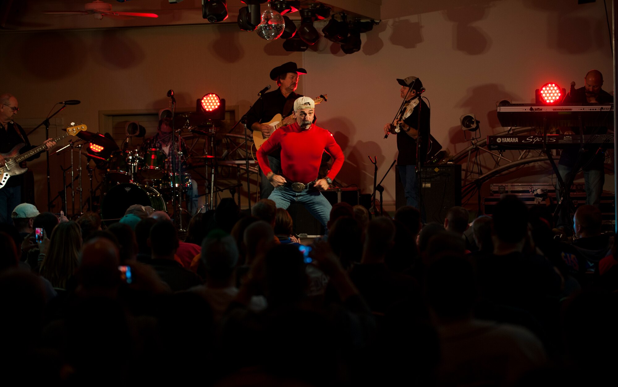 Country music artist Aaron Tippin puts on a show at the Loring Club while visiting Kunsan Air Base, Republic of Korea, Oct. 25, 2013. Tippin performed at several military bases around Korea in a tour sponsored by Armed Forces Entertainment and Stars for Stripes. (U.S. Air Force photo by Senior Airman Clayton Lenhardt/Released)