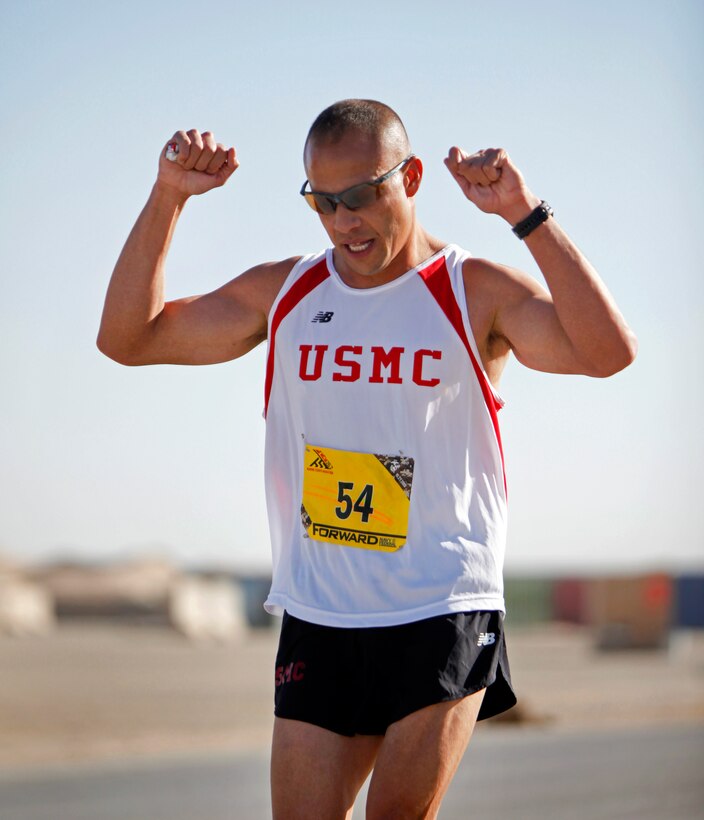 U.S. Marine Corps Capt. Pedro Rodriguez runs the 26.2-mile course of the Marine Corps Marathon Forward on Camp Leatherneck in Afghanistan's Helmand province, Oct. 27, 2013. Rodriguez finished second with a time of 2:47:11.