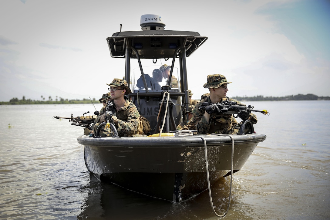 United States Marines with Africa Partnership Station participated in a training exercise focusing on riot control, riverine operations, ambush reaction drills and more October 18, 2013. Each exercise, led by British Marine forces, challenged the Marines through different scenarios focusing on all aspects of military tactics. APS is an international security cooperation initiative, facilitated by U.S. Naval Forces Africa, aimed at strengthening global maritime partnerships through training and collaborative activities in order to improve maritime safety and security in Africa. 