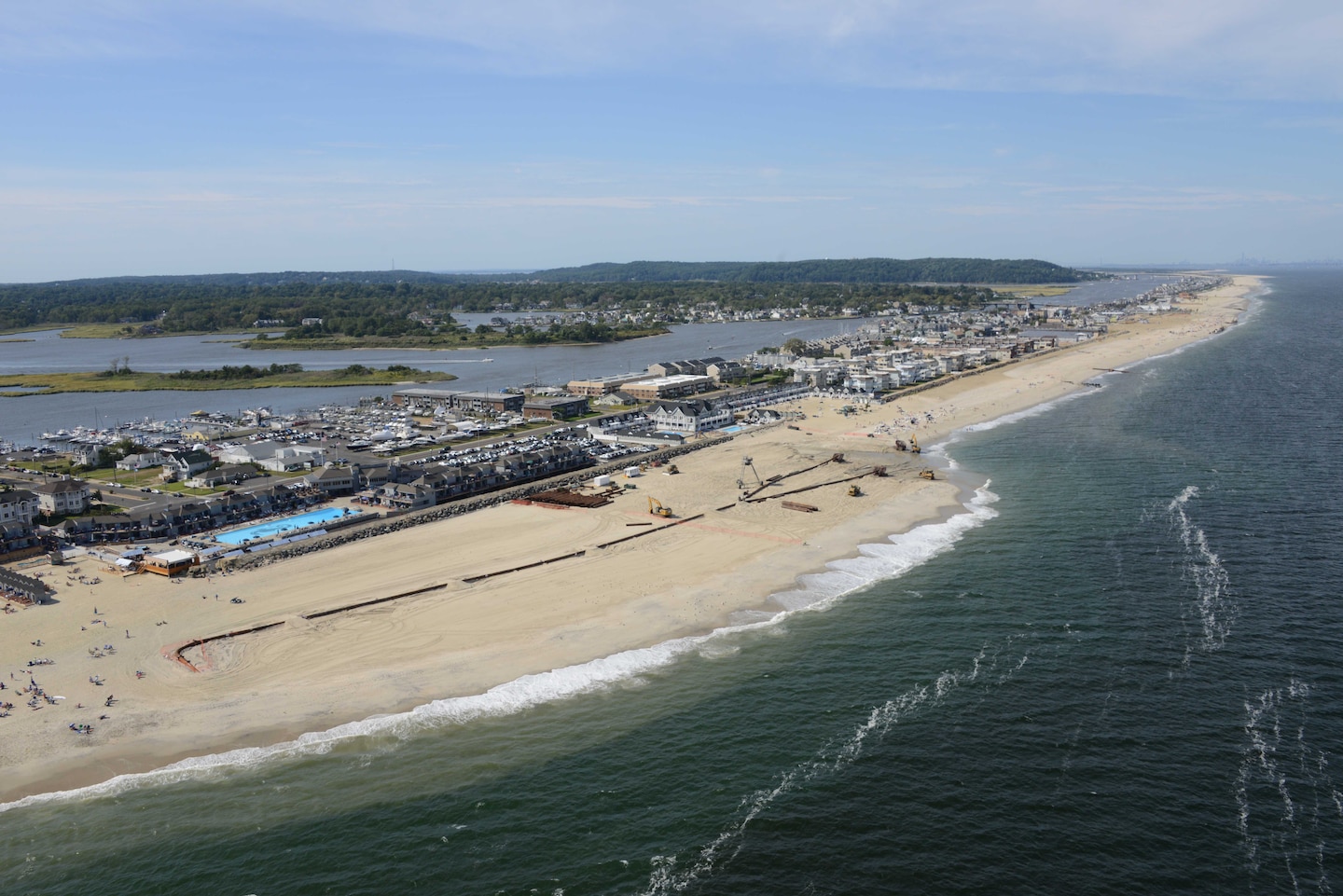 Aerial image from September 7, 2013 shows a completed portion of a beach in Sea Bright New Jersey as restoration work continues. The Corps is placing roughly 8 million cubic yards of sand from Sea Bright to Manasquan Inlet to replace sand lost during Hurricane Sandy and restore the project area to its original design. This is being done to restore the previously built risk reduction beach project and help reduce coastal storm risks to the community in the future.