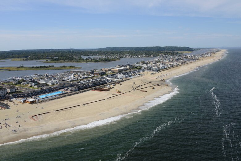 Aerial image from September 7, 2013 shows a completed portion of a beach in Sea Bright New Jersey as restoration work continues. The Corps is placing roughly 8 million cubic yards of sand from Sea Bright to Manasquan Inlet to replace sand lost during Hurricane Sandy and restore the project area to its original design. This is being done to restore the previously built risk reduction beach project and help reduce coastal storm risks to the community in the future.